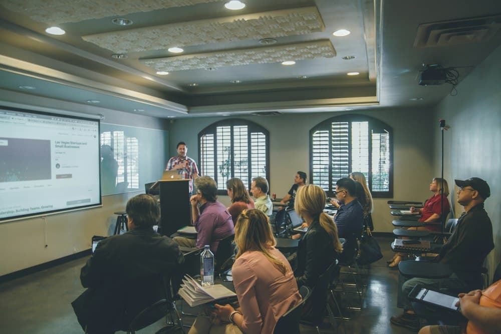 Students and faculty participating in an interactive academic seminar